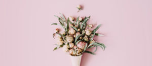 Image of a floral bouquet in pink background